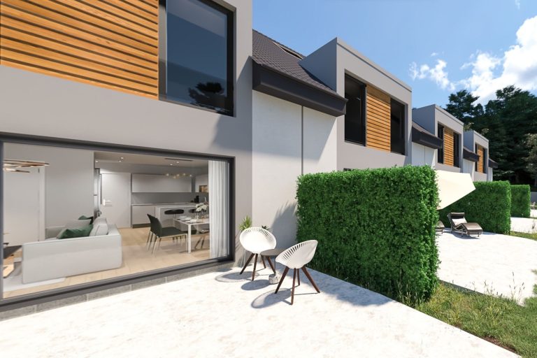 Moderne Wohnhäuser mit Holzverkleidung und Gartenlandschaft. Helle, einladende Architektur.