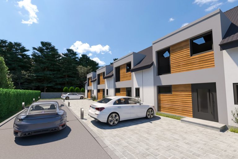Moderne Reihenhäuser mit Holzverkleidung und zwei geparkten Autos in einer ruhigen Umgebung.